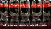 The beverage giant raised its annual profit estimates